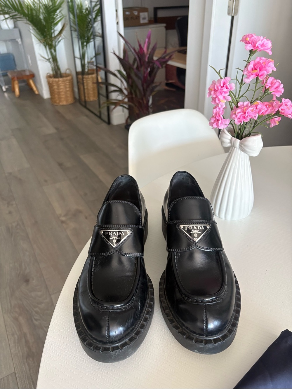 Prada Black Leather Penny Loafers with Silver Triangle Logo